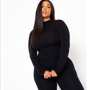 Turtle neck. Never worn.